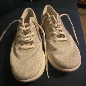 Cream and gold Nike sneakers size 10 in women